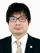 弁護士　佐藤　晃